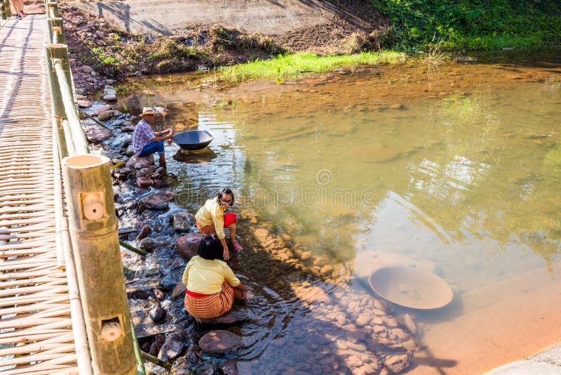 Lifestyle of people in countryside to wash beside the canal stock photos Lifestyle of people in countryside to wash beside the canal stock photos
