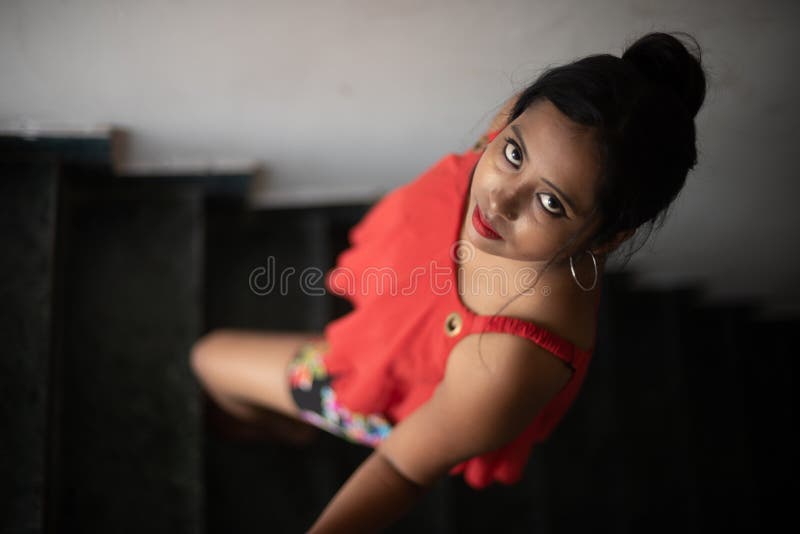 Lifestyle Portrait of an Indian Bengali Young Girl in Red Casual Wear  Inside Indian Household. Stock Image - Image of girl, female: 205757419