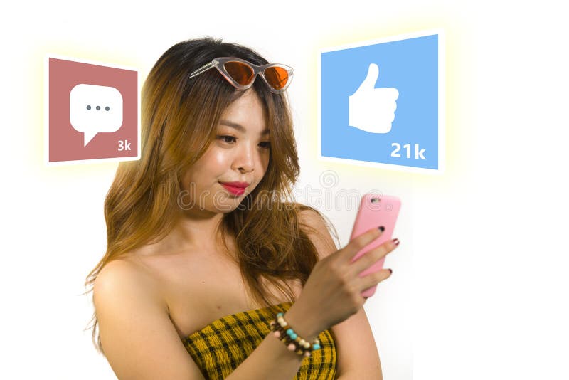 Lifestyle portrait of young happy and attractive Asian Korean woman using internet mobile phone composite with social media app stock image Lifestyle portrait of young happy and attractive Asian Korean woman using internet mobile phone composite with social media app stock image