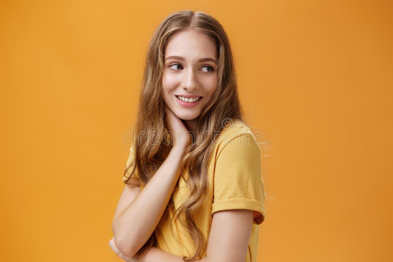 Soft and Tender Beautiful Young Girl with Wavy Fair Hair Turning Back and  Look Right Touching Neck Gently Smiling Silly Stock Photo - Image of cute,  happy: 237344136