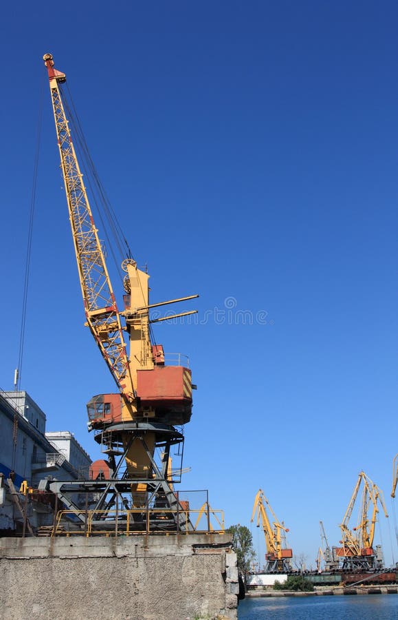 Lifting cranes in port