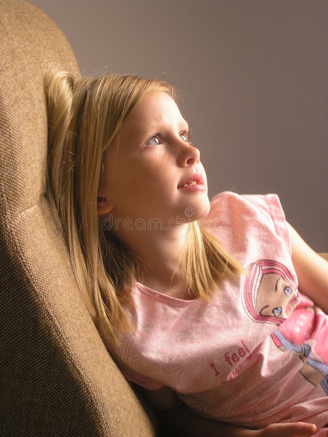 pretty young white caucasian girl looking into the light