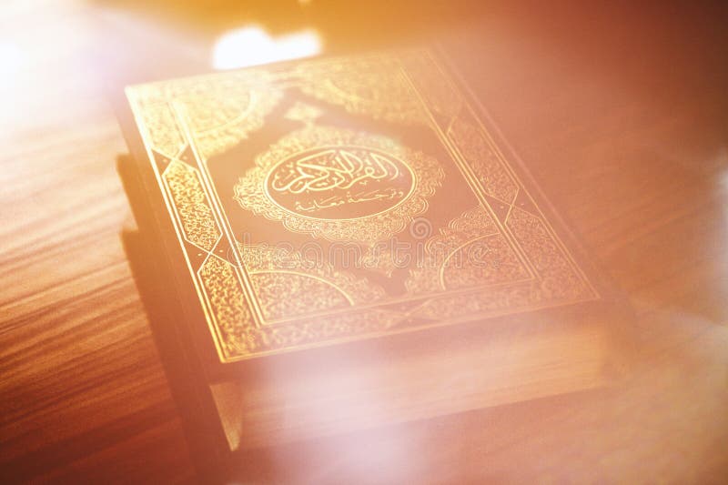 Light beams over Islamic holy book quran