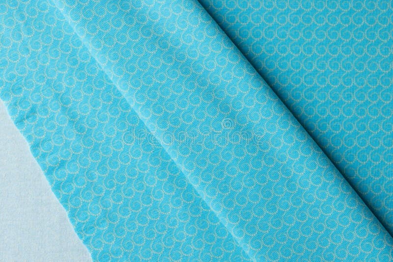 Light blue fabric cloth texture with print for background and design art work royalty free stock images