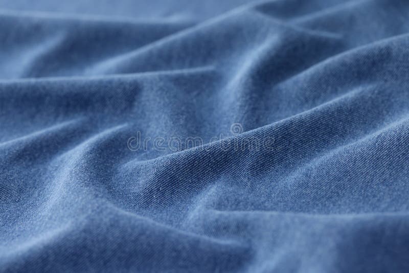 Light blue jeans fabric cloth texture background royalty free stock photo