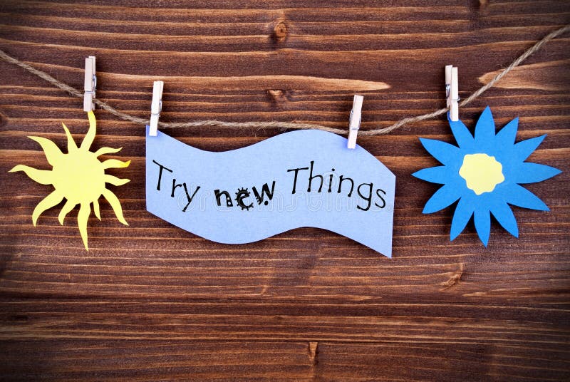 Light Blue Lable Saying Try New Things