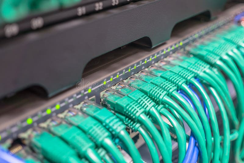 Light blue patch cord internet cables royalty free stock photos