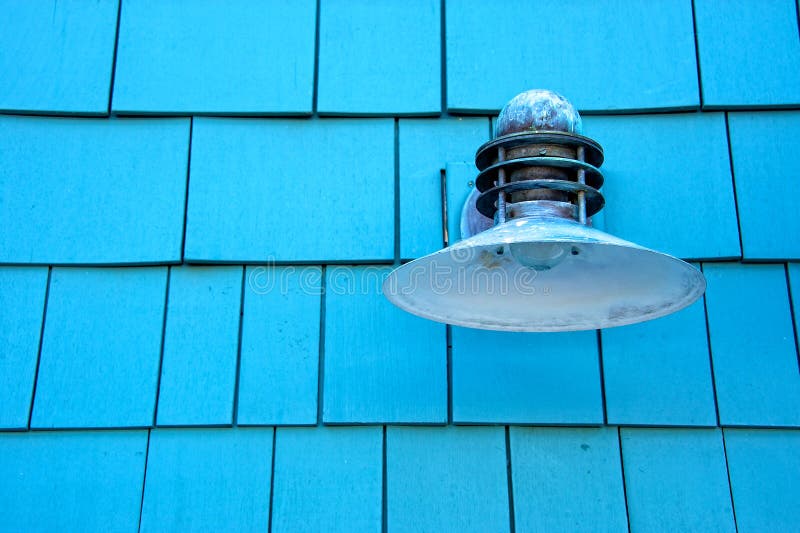 Light on blue wall stock photo. Image of blue, shingles 19364602