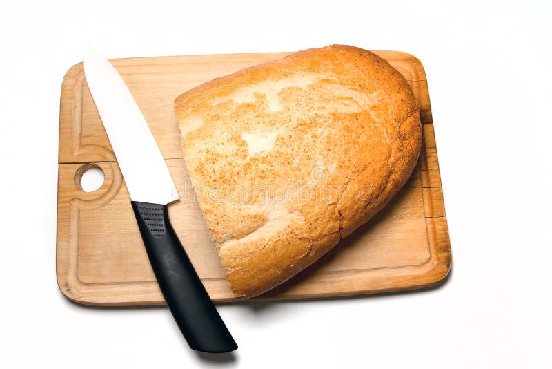 Light Bread and Knife on Cutting Board Isolated Stock Photo Image of