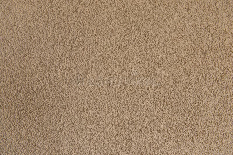 Light Brown Concrete Stucco Wall. Seamless Background Texture. Close-up