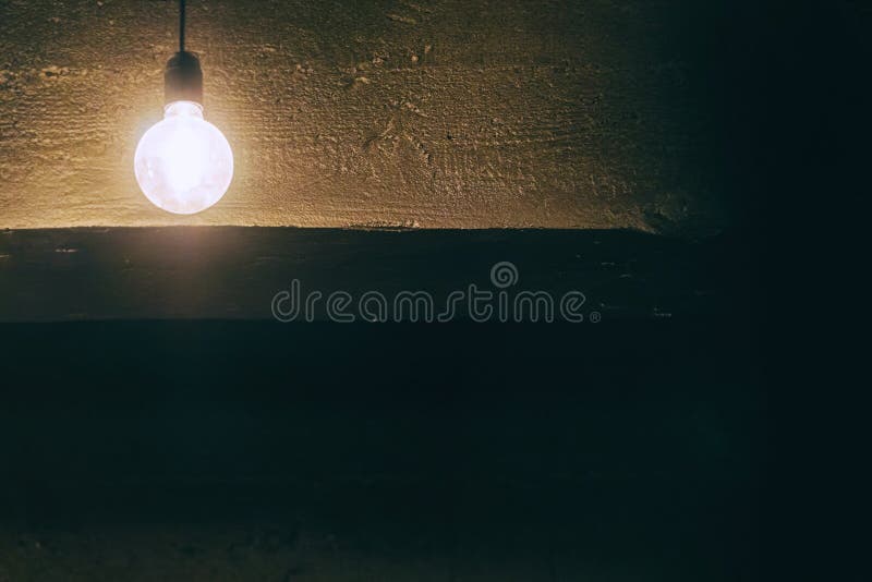 Light Bulb Against the Dark Ceiling Stock Photo Image of gloomy