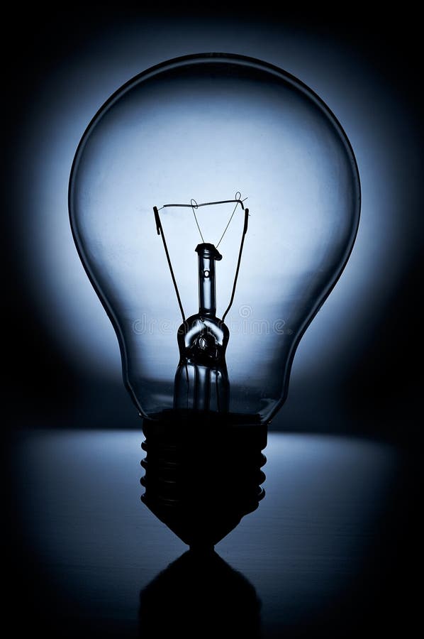 Light Bulb On Black Background With Blue Light Stock Photo Image of