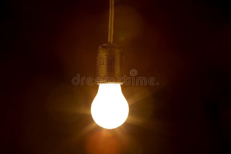 Light Bulb on a Black Background Stock Photo Image of glowing, energy