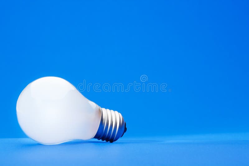 Light bulb on blue