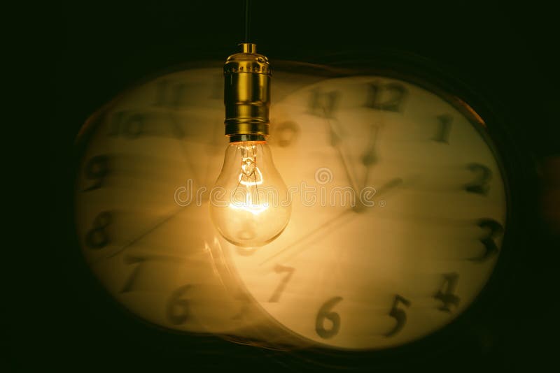 Light bulb and clock stock photo. Image of light, watch - 85996180