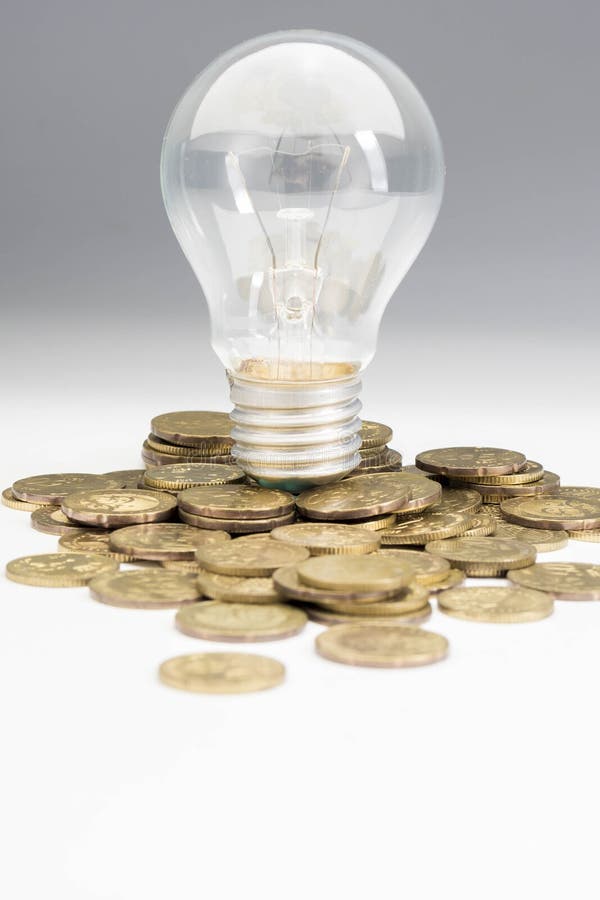 Light Bulb with Coins, Money Ideas Concept Stock Image Image of
