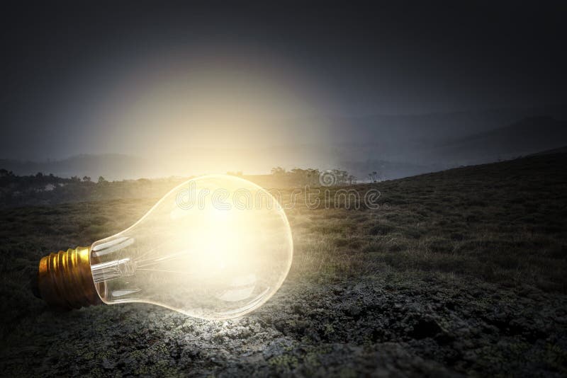 Light Bulb Glowing in Darkness Stock Photo Image of leadership