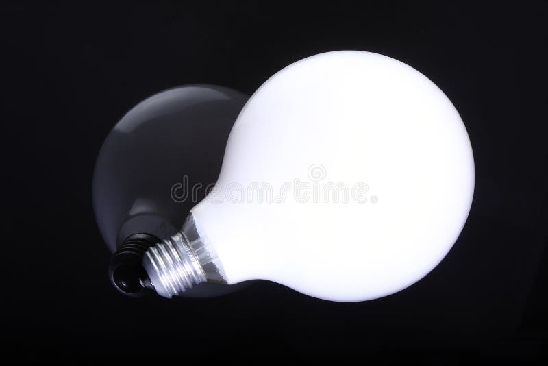 Light Bulb With Reflection On Black Background Stock Photo Image of