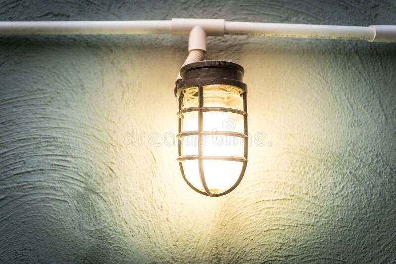 Light bulb on the wall stock image. Image of electricity 39651065