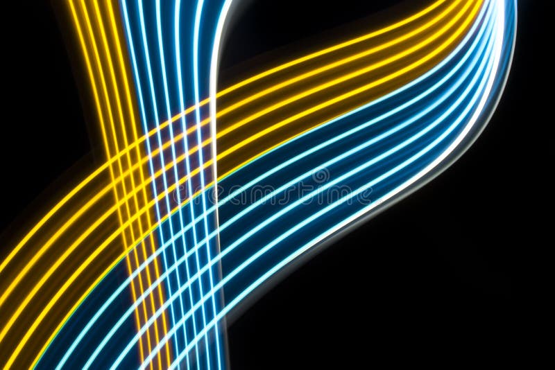 Yellow and blue light curve lines on a black background