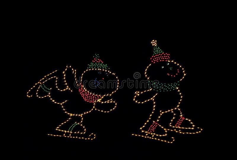 Light display depicting two skaters