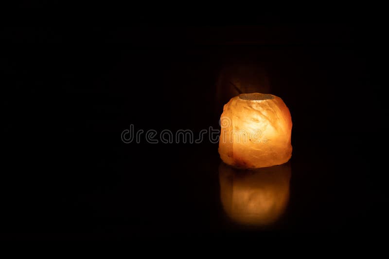 Light Emitted by a Salt Lamp with Internal Candle Stock Image Image