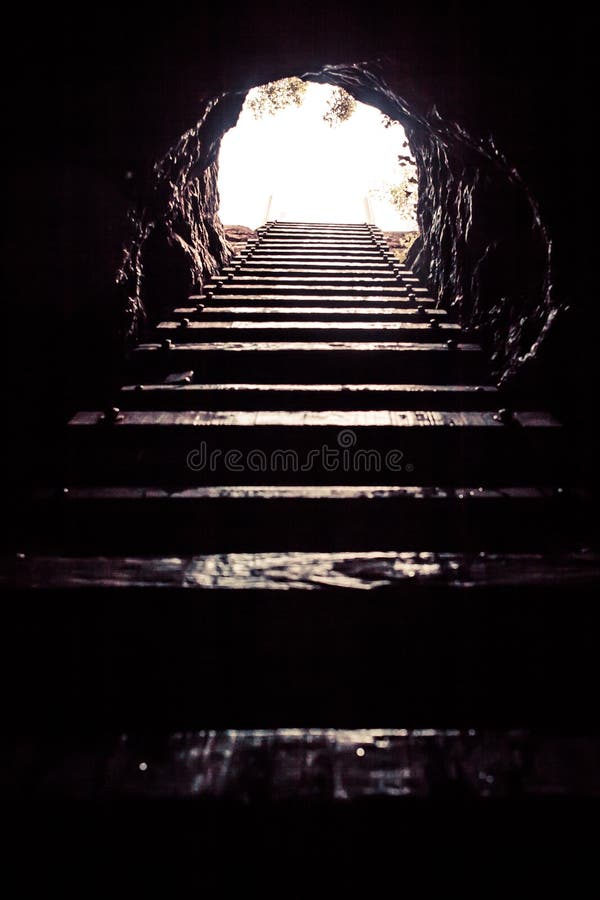Stair with light at the exit of the Cuzama Cenote, Yucatan, Mexico