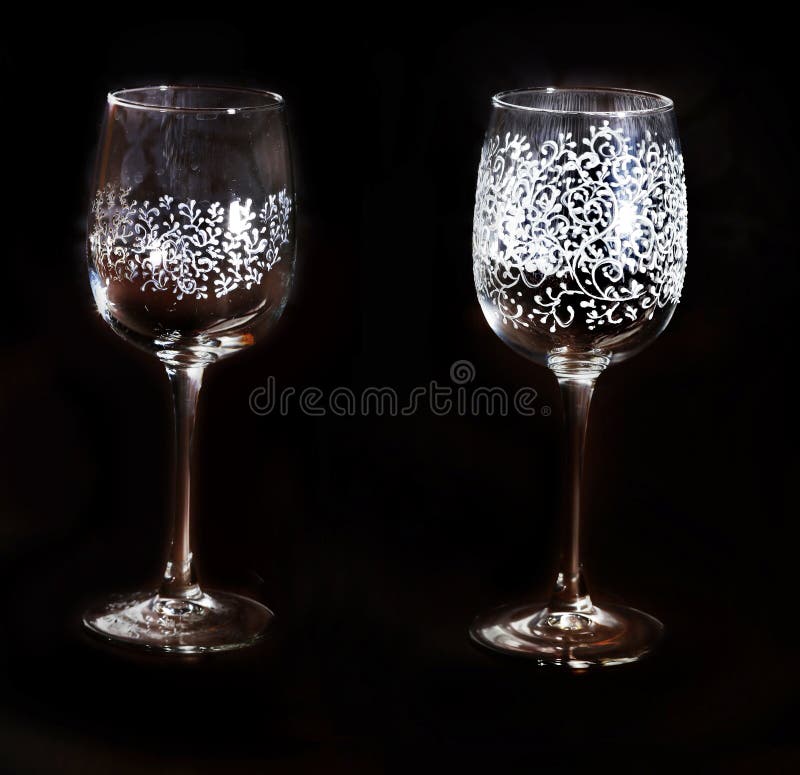 Light glass with beautiful silver pattern on a black background royalty free stock photography Light glass with beautiful silver pattern on a black background royalty free stock photography