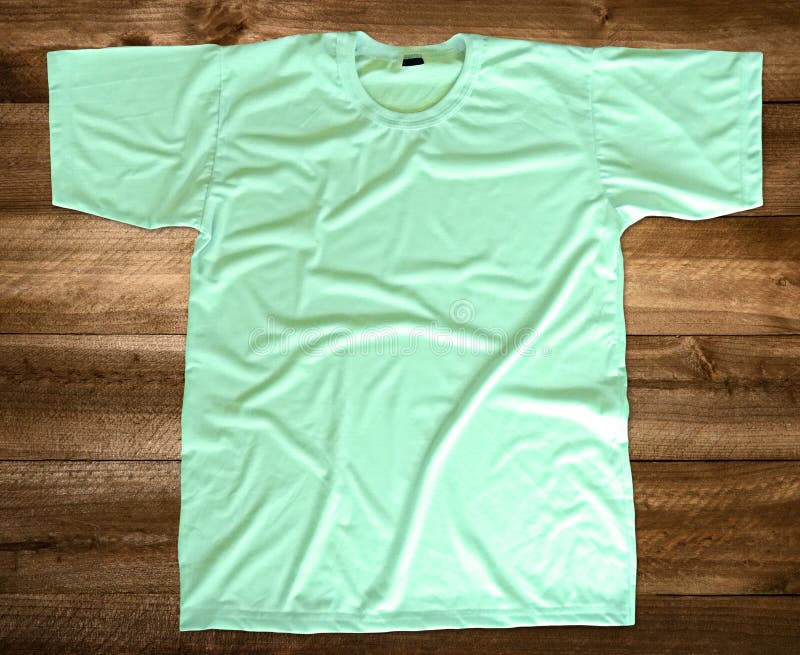 Download Light Green T-shirt Mockup Front View Wooden Background ...