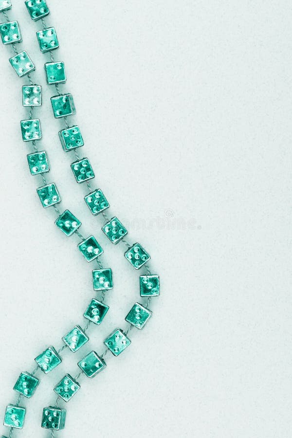 Light green textured cardstock paper with bead border background royalty free stock photo