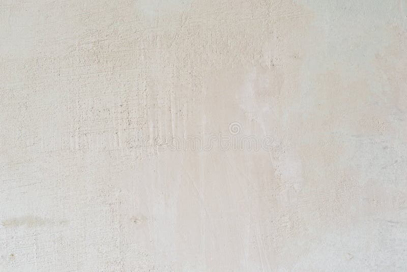 Light old wall without a ceiling. Grunge gray wall. Background texture of putty wall