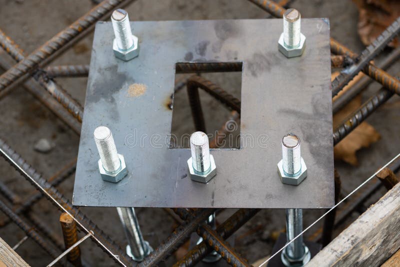 Light pole base and anchor bolts in concrete base