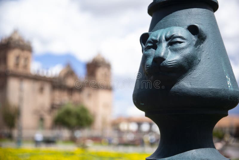 Light pole with a puma sculpture in Cusco Peru.