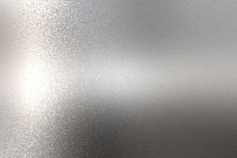 Light shining on rough chrome metal wall texture, abstract background stock photography