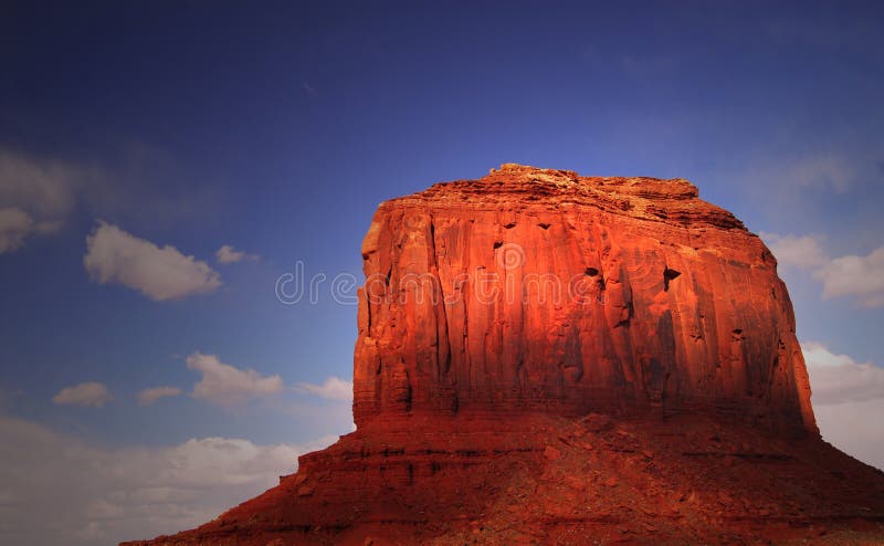 Light striking a rock formation in Monument Valley