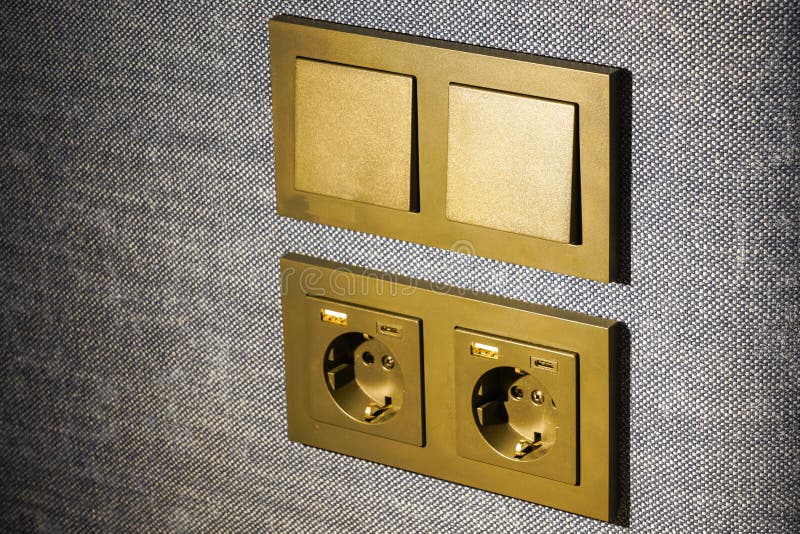 Light switch, 220V, USB and USB type C socket block built into upholstered furniture fabric surface. Light switches, 220V, USB and USB type C sockets are built into the fabric surface of the upholstered furniture