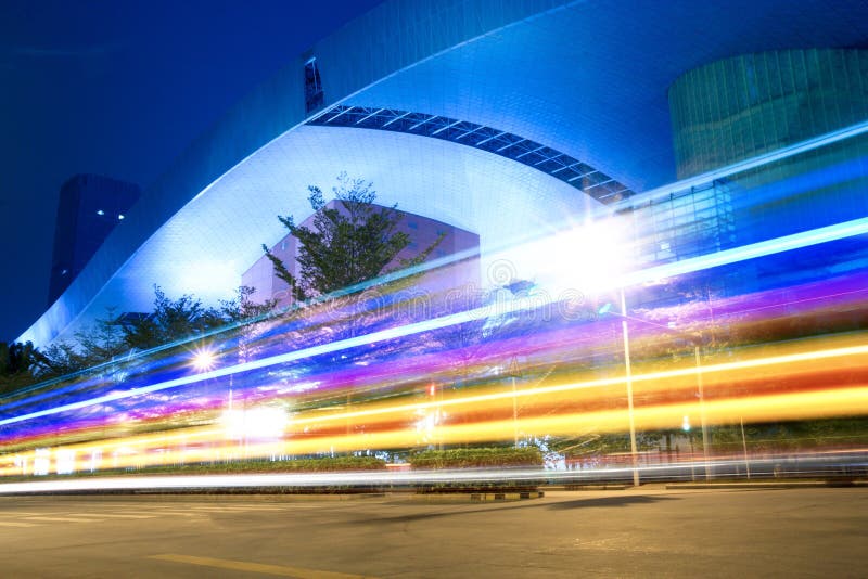 Light trails on the abstract building background. Light trails on the abstract building background