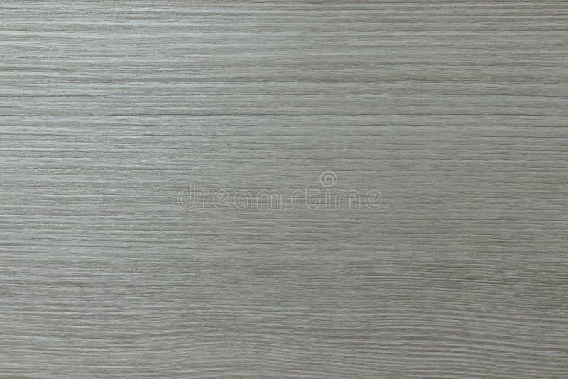Light wood texture background. Embossed design of wooden strips of material, solid color background