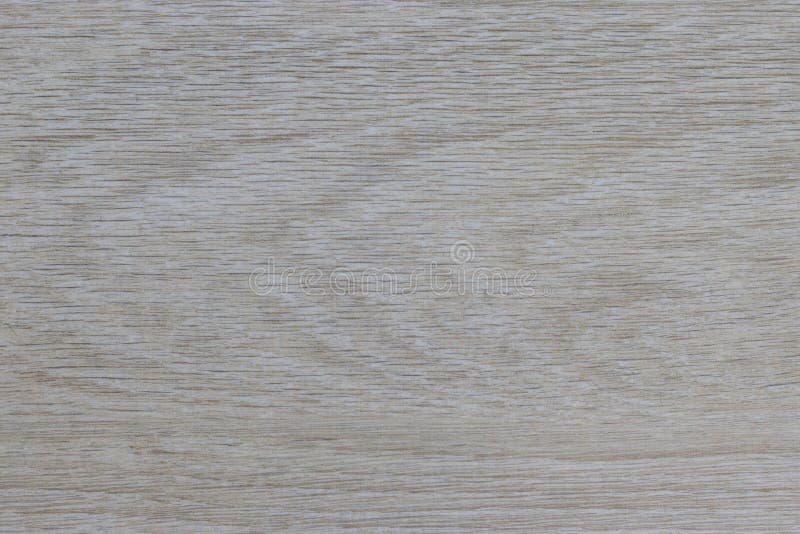 Light wood texture background. Embossed design of wooden strips of material, solid color background