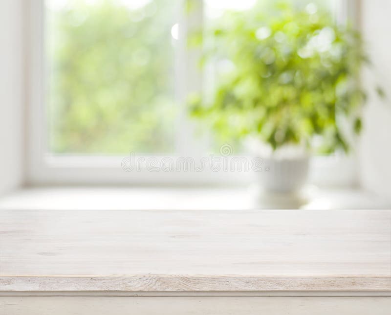Light wooden table on defocuced spring window background royalty free stock photos Light wooden table on defocuced spring window background royalty free stock photos