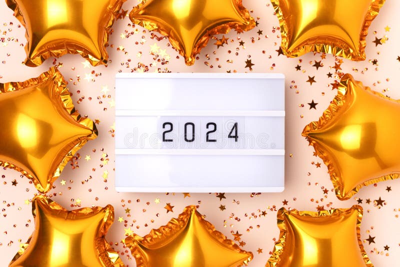 2024 Numbers by Rainbow Foil Balloons. New Year Layout Stock Image