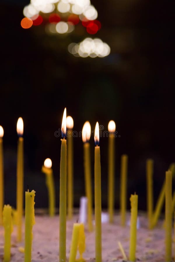 Lighted candles in church stock photo. Image of candles 66339536