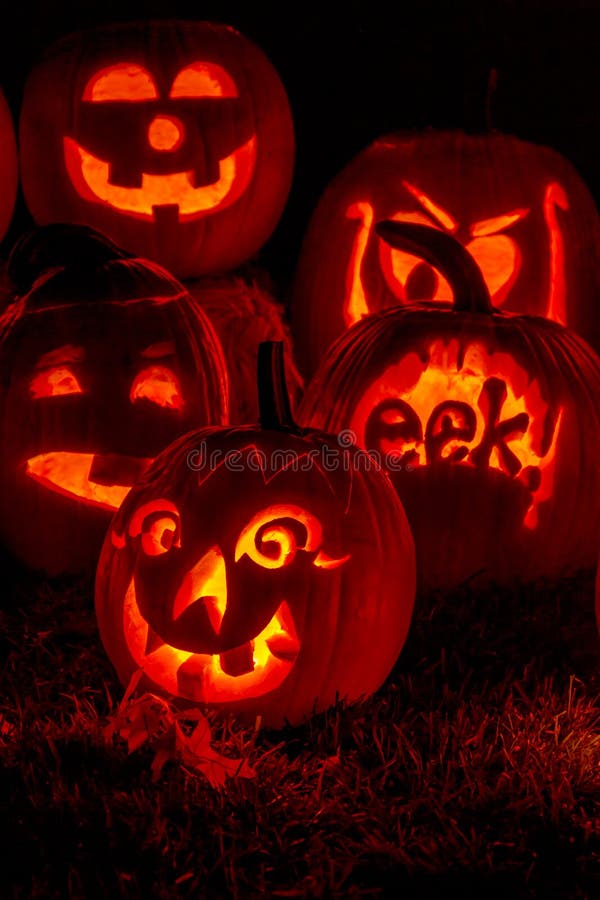 Lighted Halloween Pumpkins with Candles Stock Image - Image of carved ...