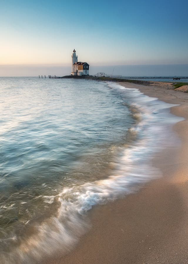 Lighthouse and beach stock image. Image of coast, gold 923101