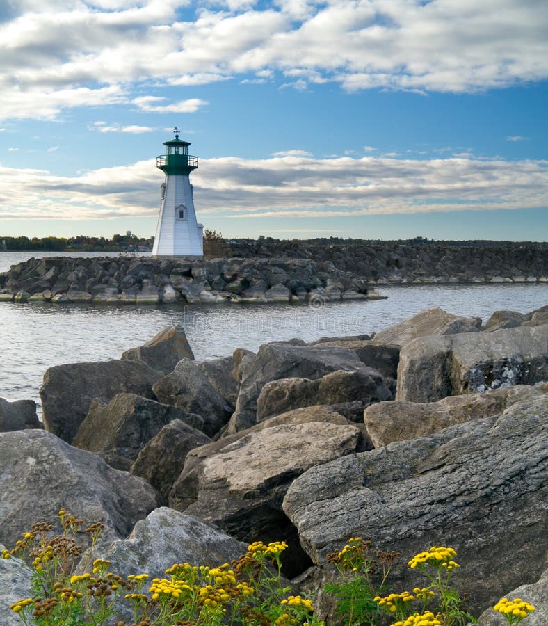 Lighthouse on a breakwater stock image. Image of cloudy - 27649113