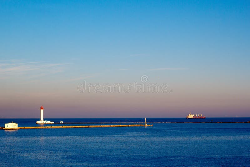 Lighthouse and Cargo Ship Leaving a Harbor Stock Photo Image of city, germany 138584472