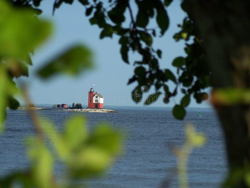 A lighthouse through the trees. A lighthouse through the trees