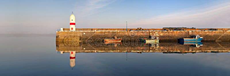 Lighthouse, Harbour, Boats with Sea Reflection