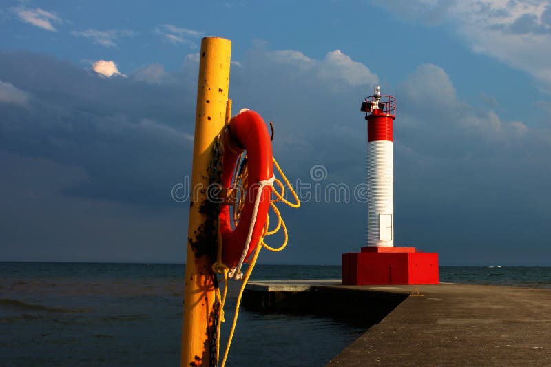 Lighthouse & Life Preserver stock photo