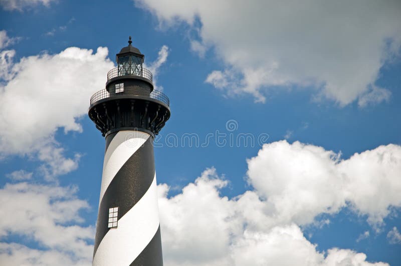 Lighthouse, sky and clouds